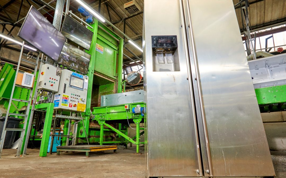 Meet the big, green fridge-crunching machine – that’s just munched it’s two millionth fridge