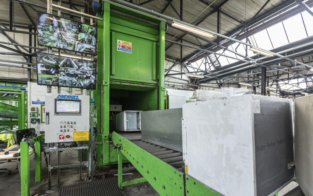 Fridges entering Bertha at AO's appliance recycling plant in Telford